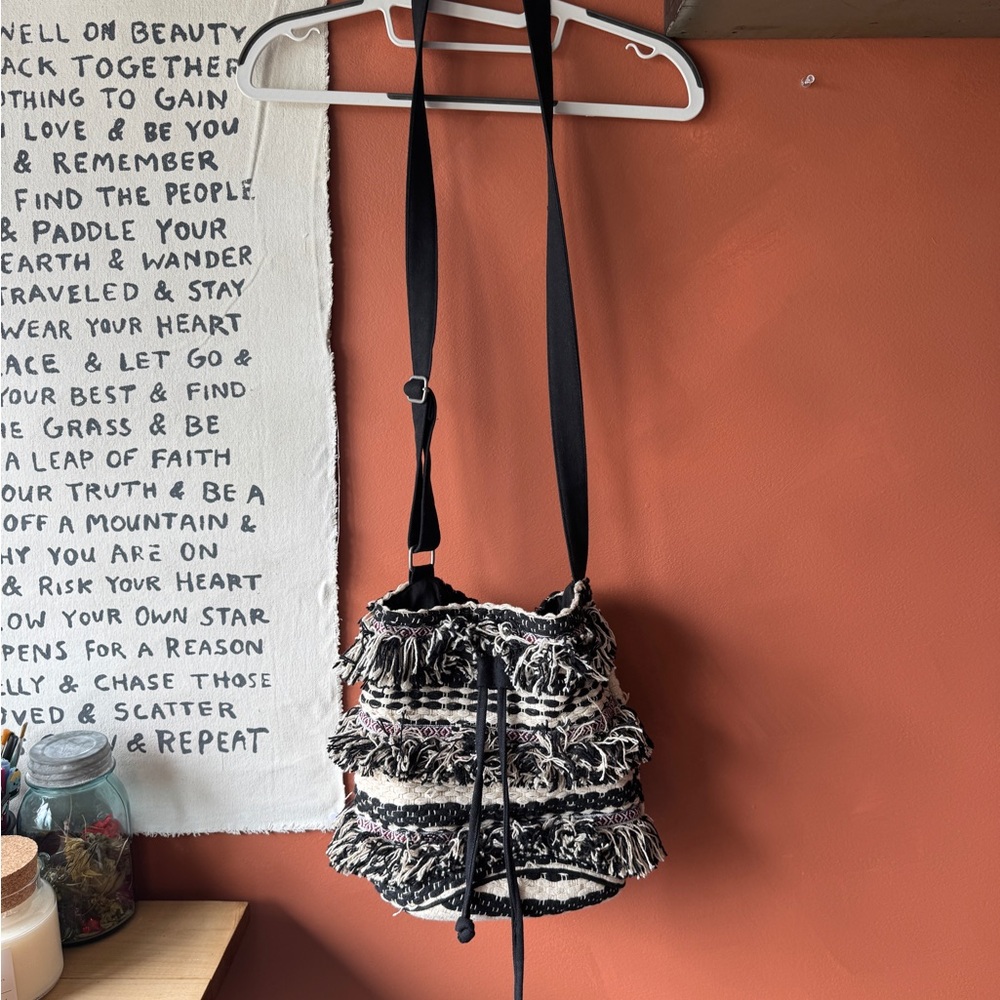 Cost Plus World Market Black and Cream Fringed Woven Crossbody Bucket Bag
